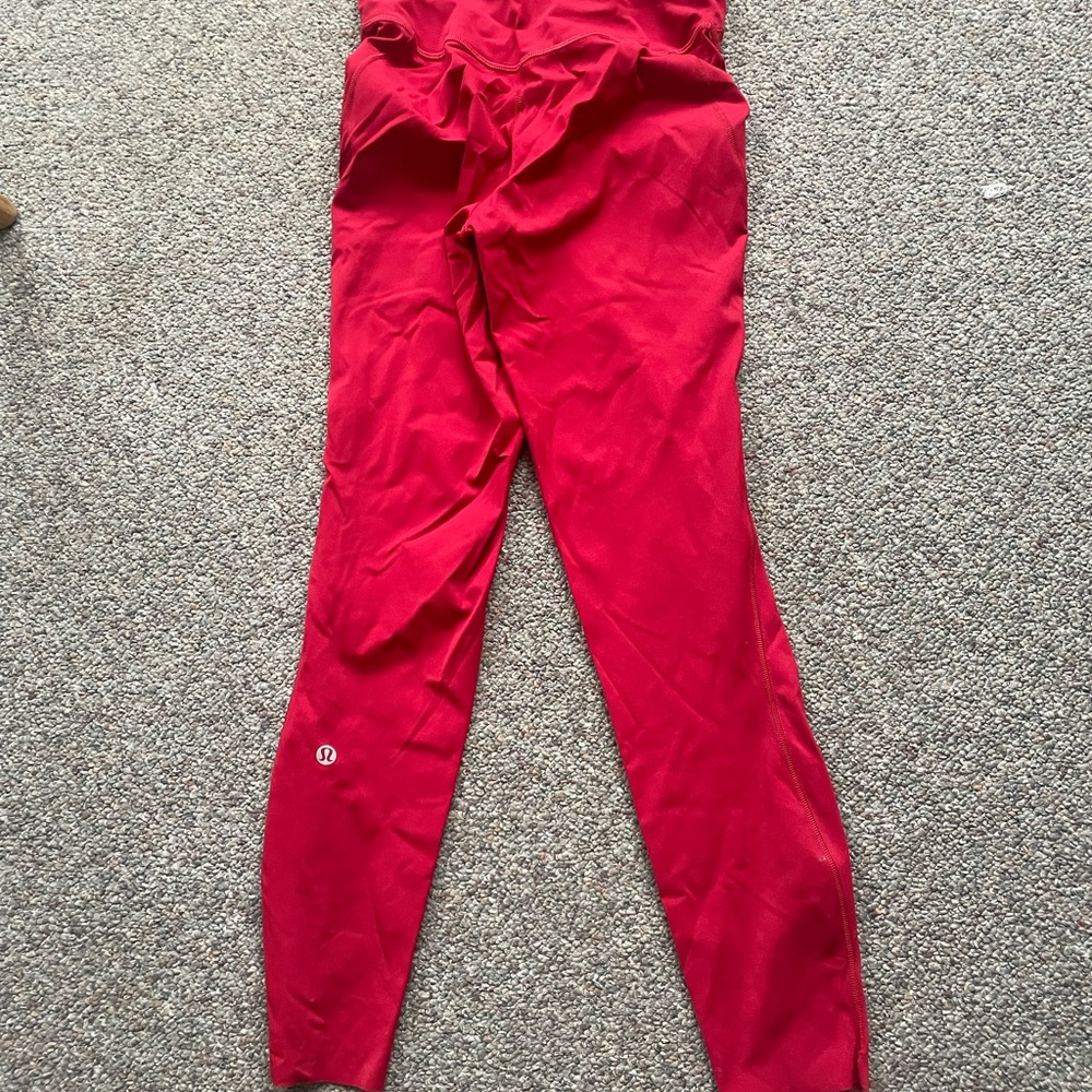 Red Lululemon yoga tights